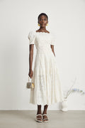 <img src="https://www.beryn-boutique.com/" 
       alt="Elegant White Lace Midi Dress for Work" 
       loading="lazy" />