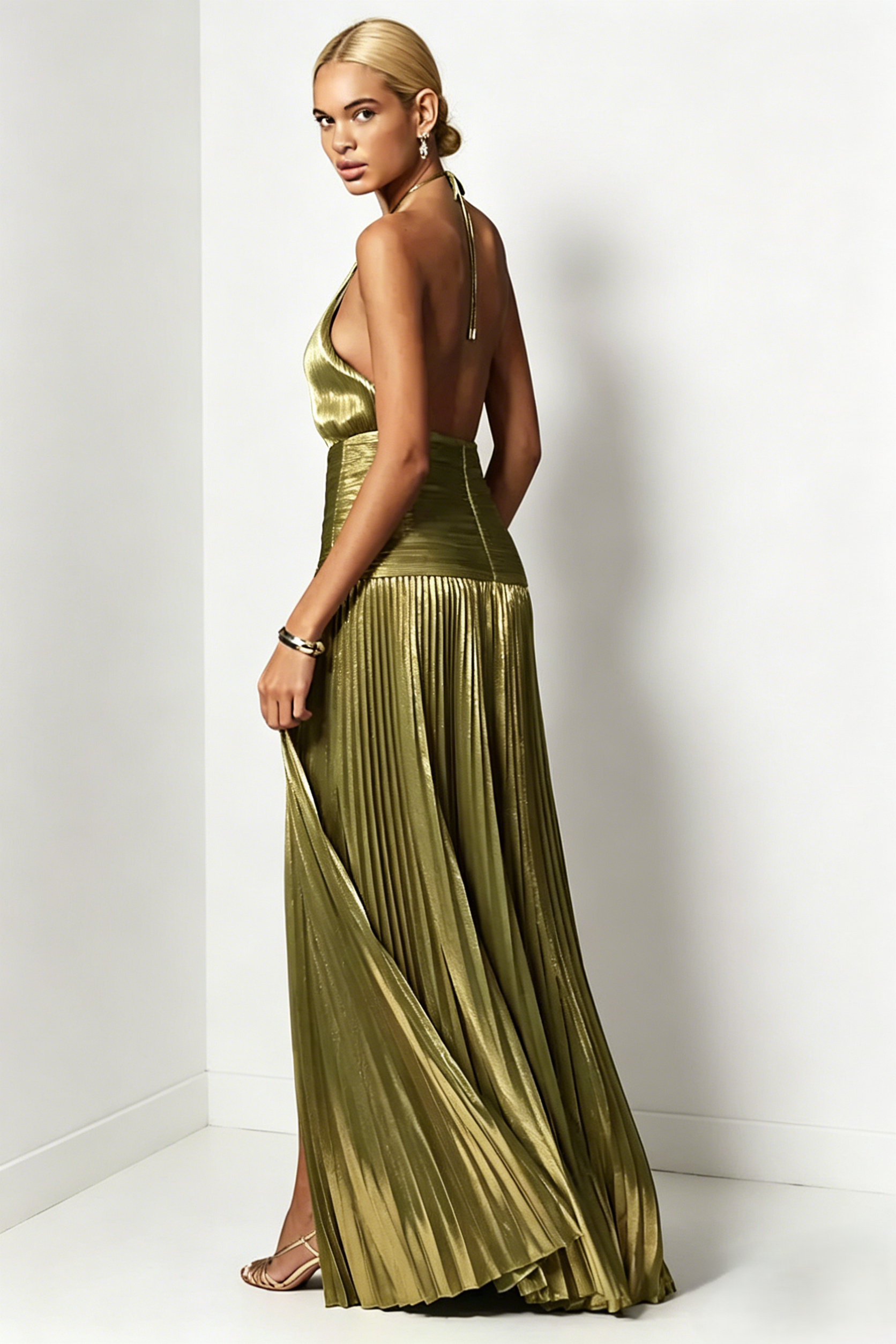 <img src="https://www.beryn-boutique.com/" 
       alt="Luxury Metallic Pleated Halter Gown" 
       loading="lazy" />