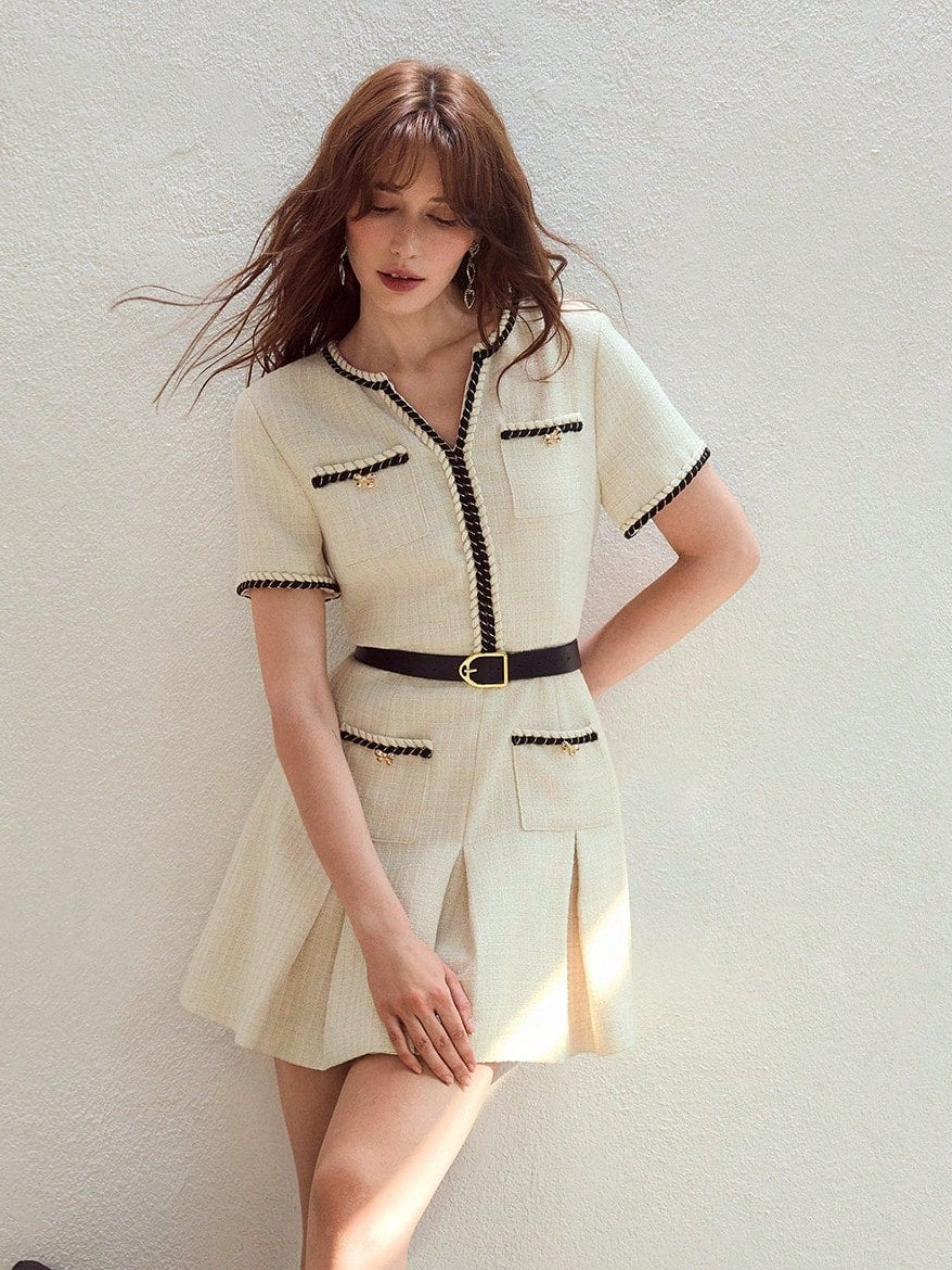 <a href="https://beryn-boutique.com/dress">
<img src="xxx.jpg" alt=<"Elegant Chanel Style Tweed Dress with Black Trim & Belted Pleated Skirt Luxury">
</a>
