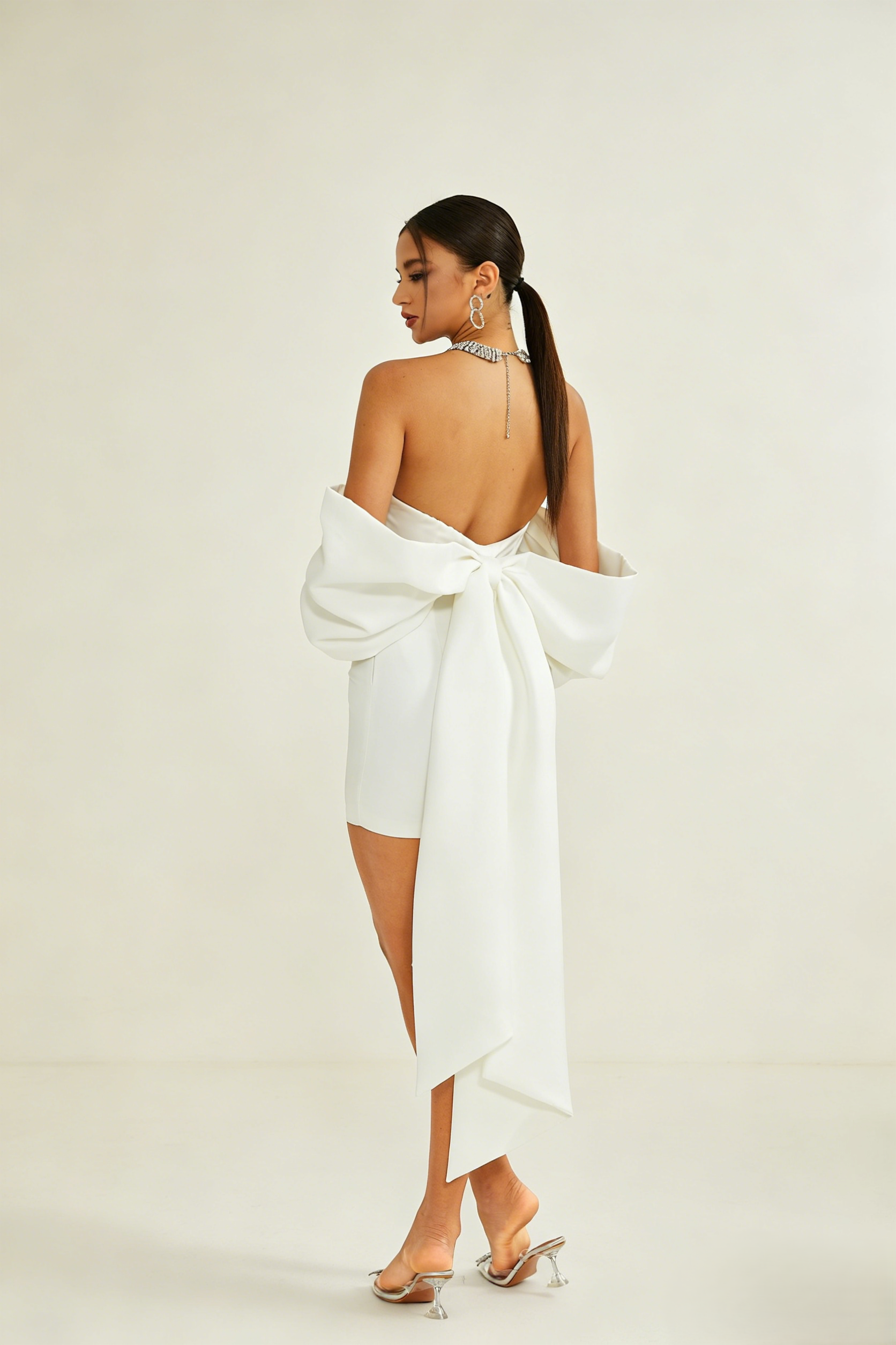 <img src="https://www.beryn-boutique.com/" 
       alt="Elegant Bow Mini Dress" 
       loading="lazy" />