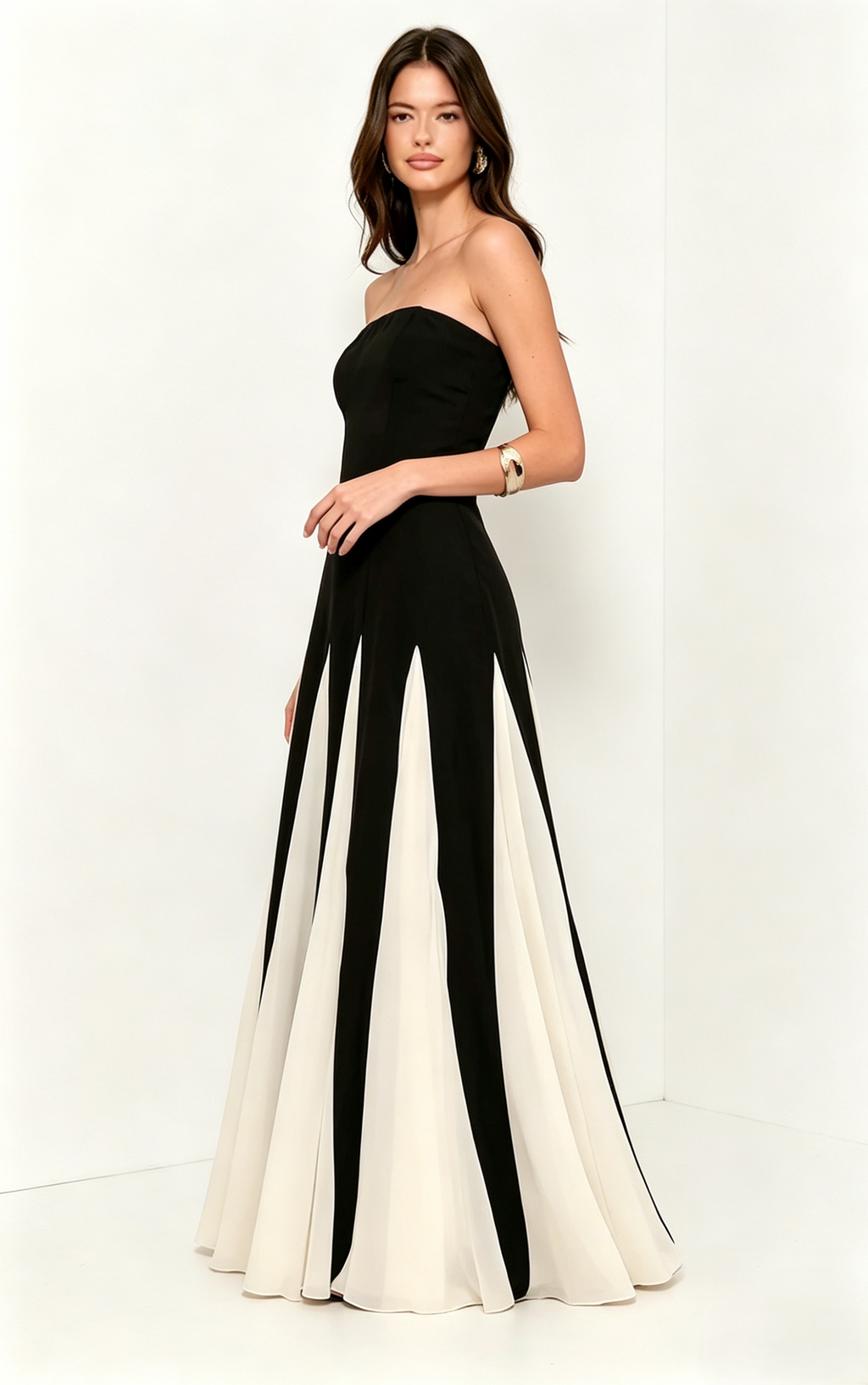 <img src="https://www.beryn-boutique.com/" 
       alt="Black and White Color  A-Line Spliced Maxi Dress" 
       loading="lazy" />