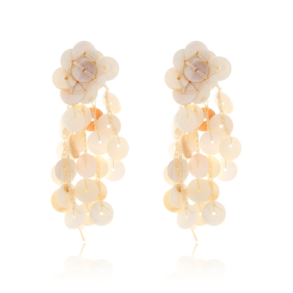 <a href="https://beryn-boutique.com/dress">
<img src="xxx.jpg" alt=<"Square Geometric Long Dangle Earrings Metal Sequin Tassel Design">
</a>

