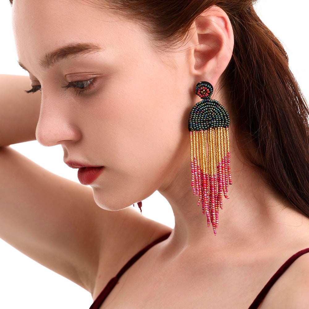<a href="https://beryn-boutique.com/dress">
<img src="xxx.jpg" alt=<"Retro Ethnic Boho Creative Handmade Tassel Dangle Earrings">
</a>
