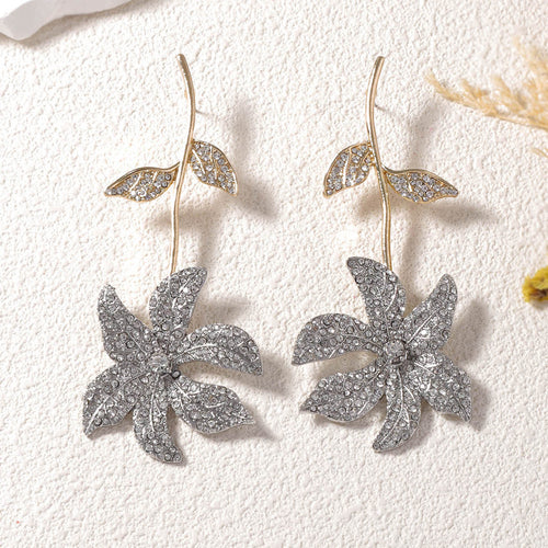 <a href="https://beryn-boutique.com/dress">
<img src="xxx.jpg" alt=<"Dainty High-end Pearl Inlaid Elegant Versatile  Flower Earrings">
</a>
