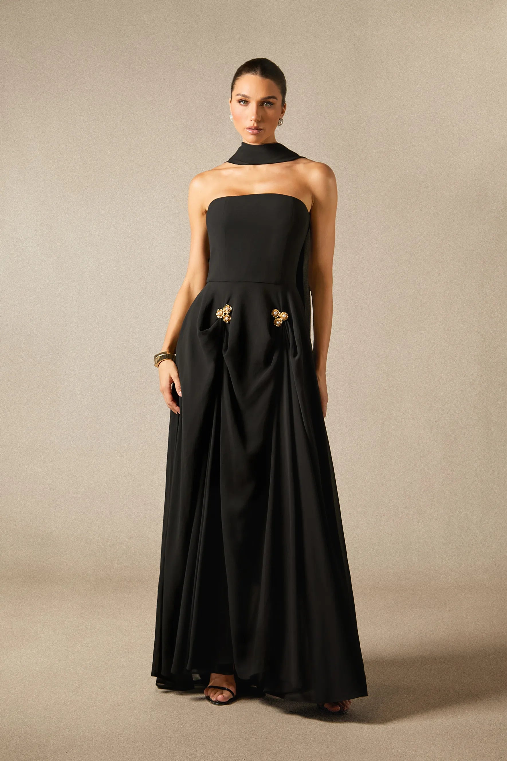 <img src="https://www.beryn-boutique.com/" 
       alt="Black Strapless Maxi Gown" 
       loading="lazy" />