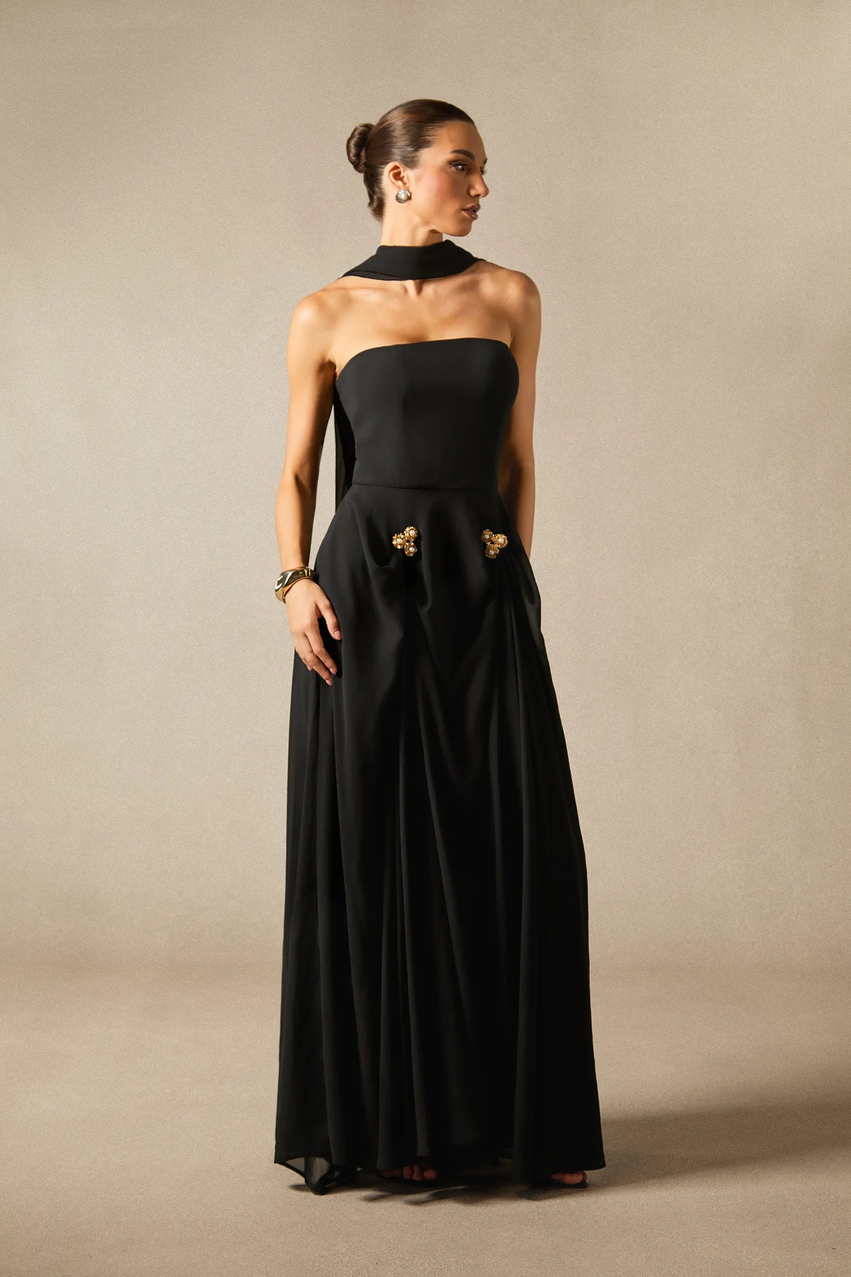 <img src="https://www.beryn-boutique.com/" 
       alt="Black Strapless Maxi Gown" 
       loading="lazy" />