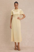 <img src="https://www.beryn-boutique.com/" 
       alt="Yellow Beaded Capelet Dress" 
       loading="lazy" />